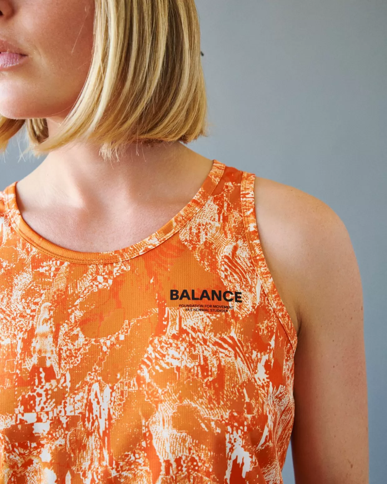 womens_balance_sleeveless_top___orange_aop_4-1.webp Gym & Training^Pas Normal Studios Women's Balance Sleeveless Top — Orange AOP